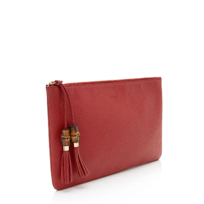 Women Gucci crossbody bags in a bold red colorGucci Leather Bamboo Tassel Zip Clutch (jOVRgR)