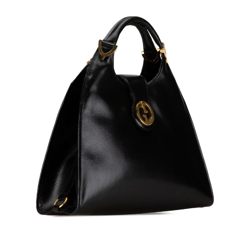 Gucci Marmont bags for women with a contrast - colored interiorGucci Leather 1973 Stirrup Handbag Jxcegh)