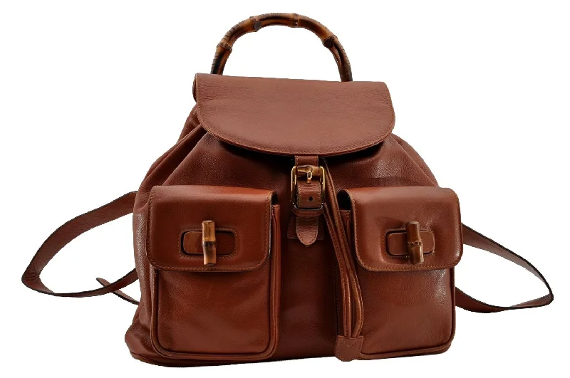 Women Gucci bags with a zippered interior pocketAuthentic GUCCI Vintage Bamboo Drawstring Backpack Leather Brown 1836I