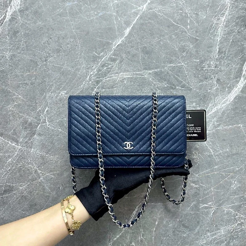 Chanel bags in luxury boutiques worldwideCaviar WOC Wallet On Chain Dark Blue SHW No 22