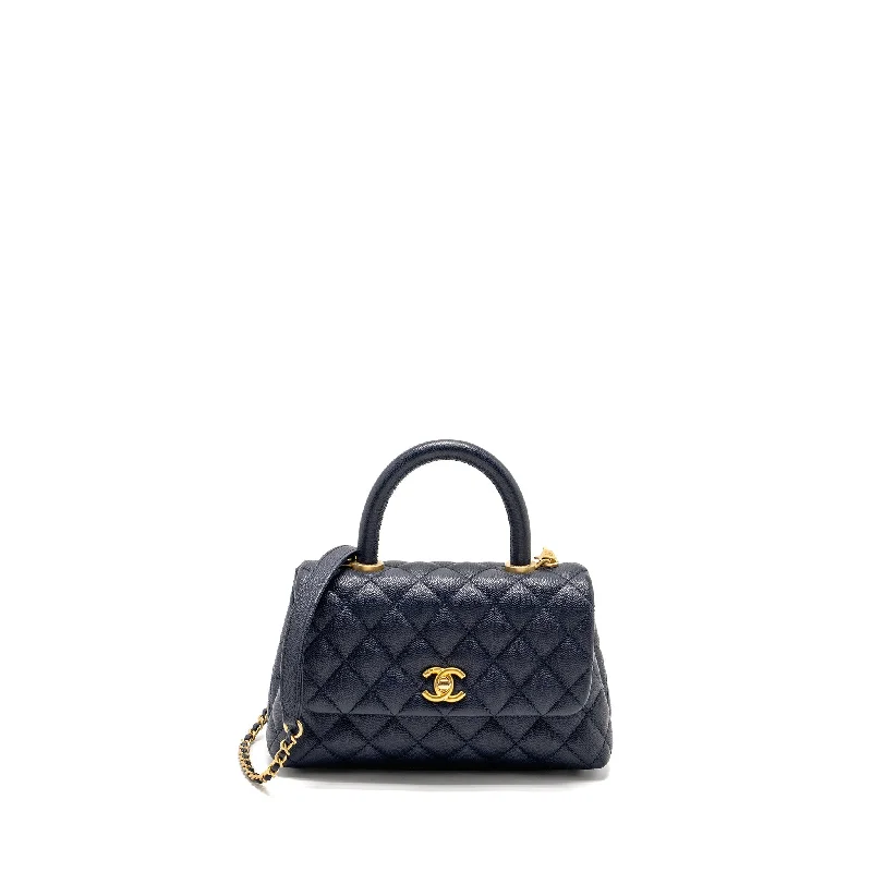 Chanel bags with exclusive seasonal designs and materialsChanel Small Coco Handle Caviar Navy GHW