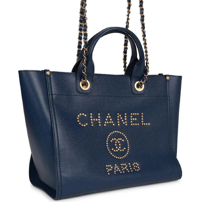 Chanel bags available at online luxury retaileChanel Small Deauville Shopping Bag Blue Caviar Antique Gold Hardware