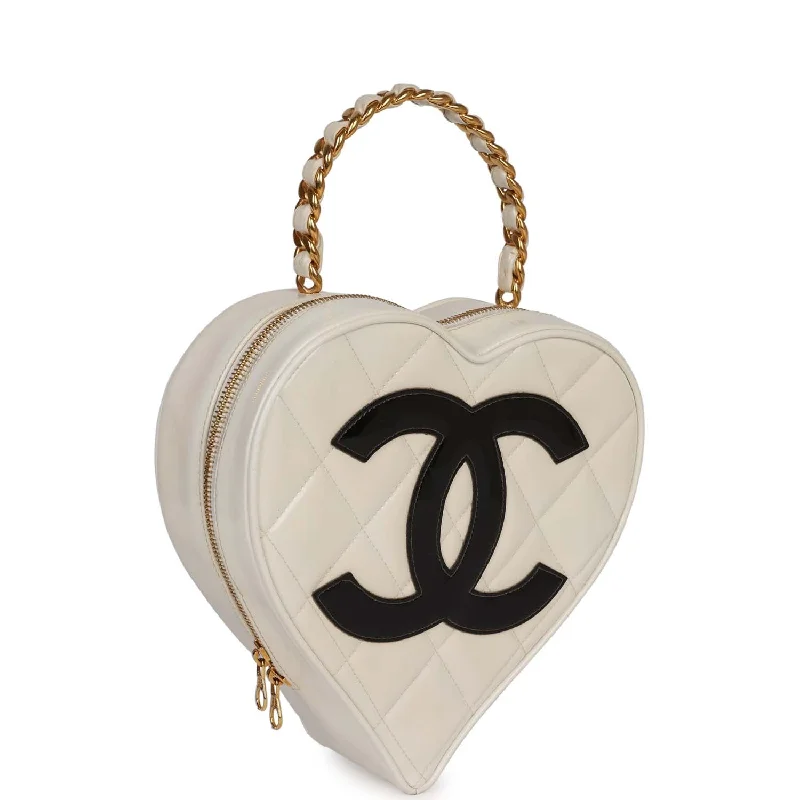 Chanel bags as wedding day accessoriesVintage Chanel Heart Vanity Bag White and Black Patent Antique Gold Hardware